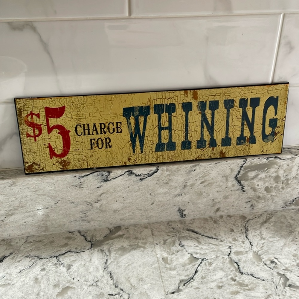 $5 charge for whining sign